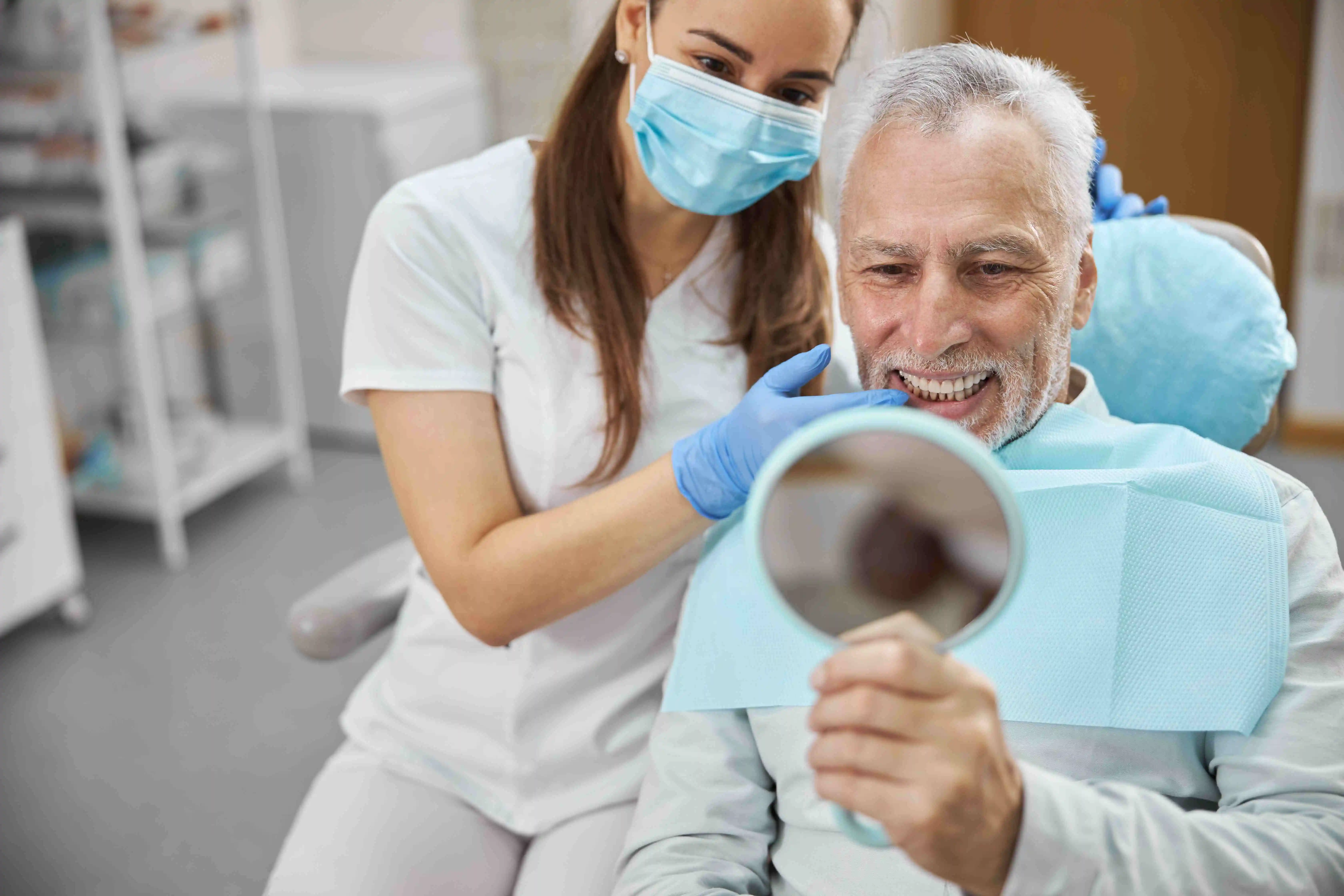 gentleman happy with his new dental implant